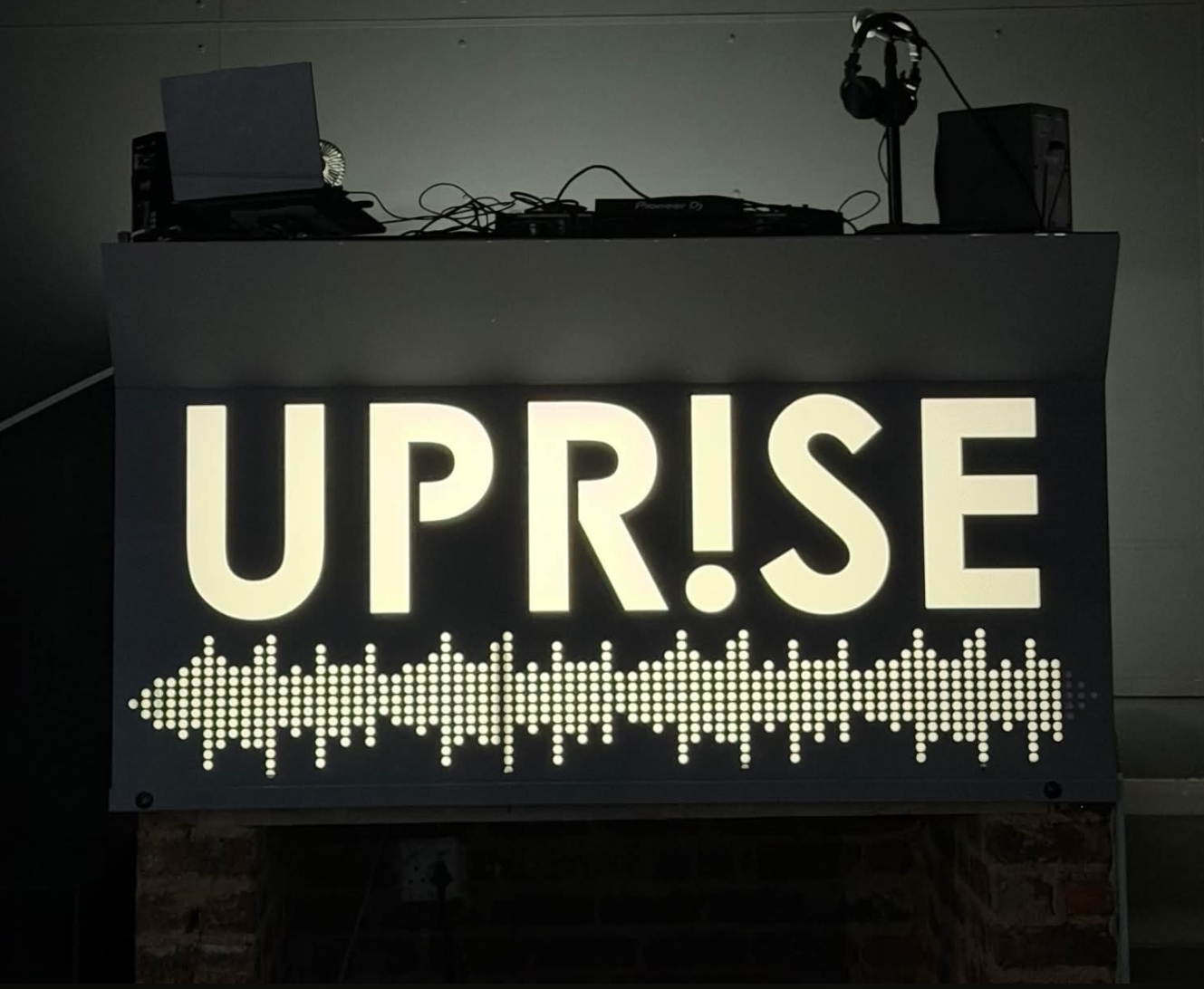 Uprise Restaurant logo